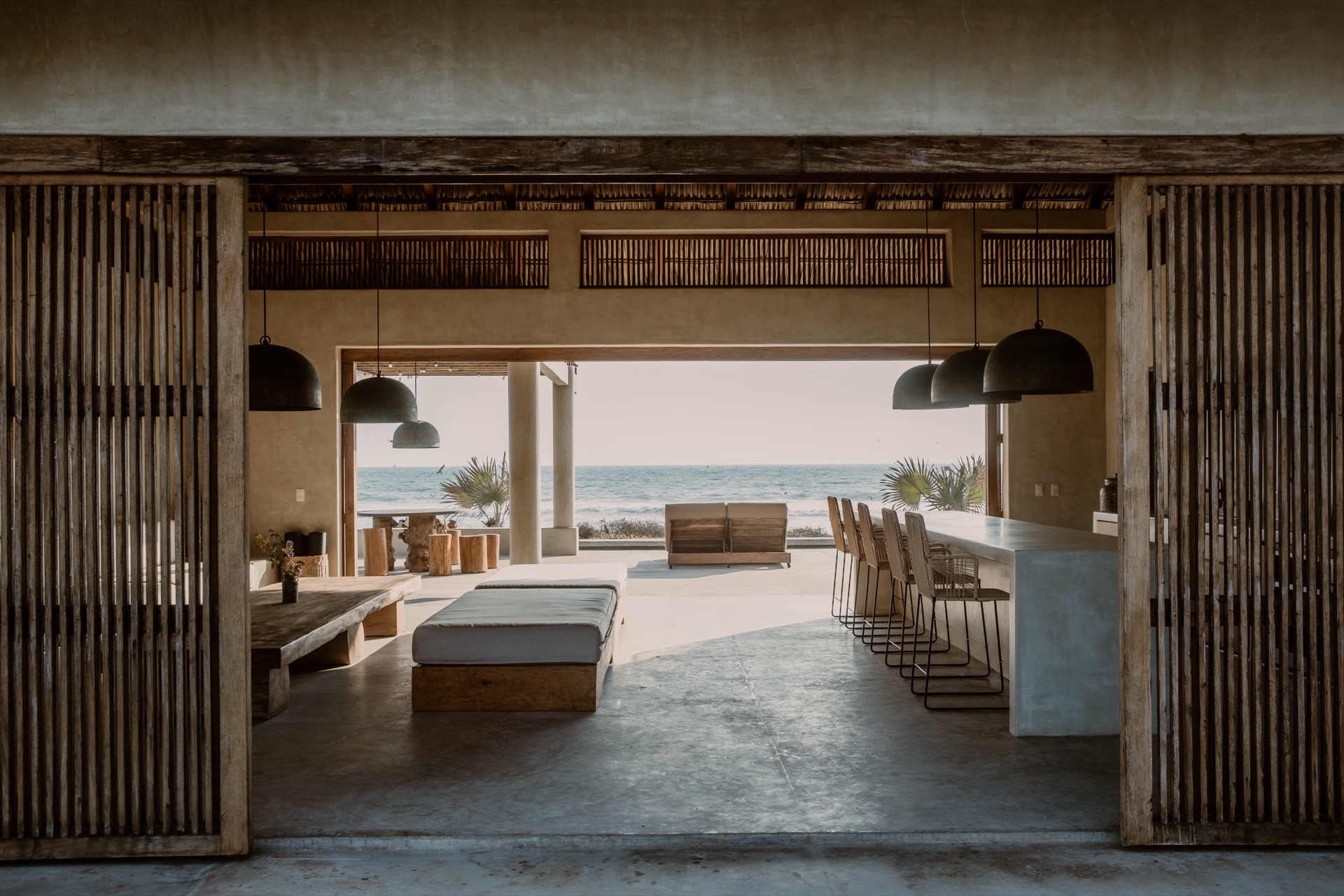 Casa Kona palapa — looking through bamboo screens to the ocean